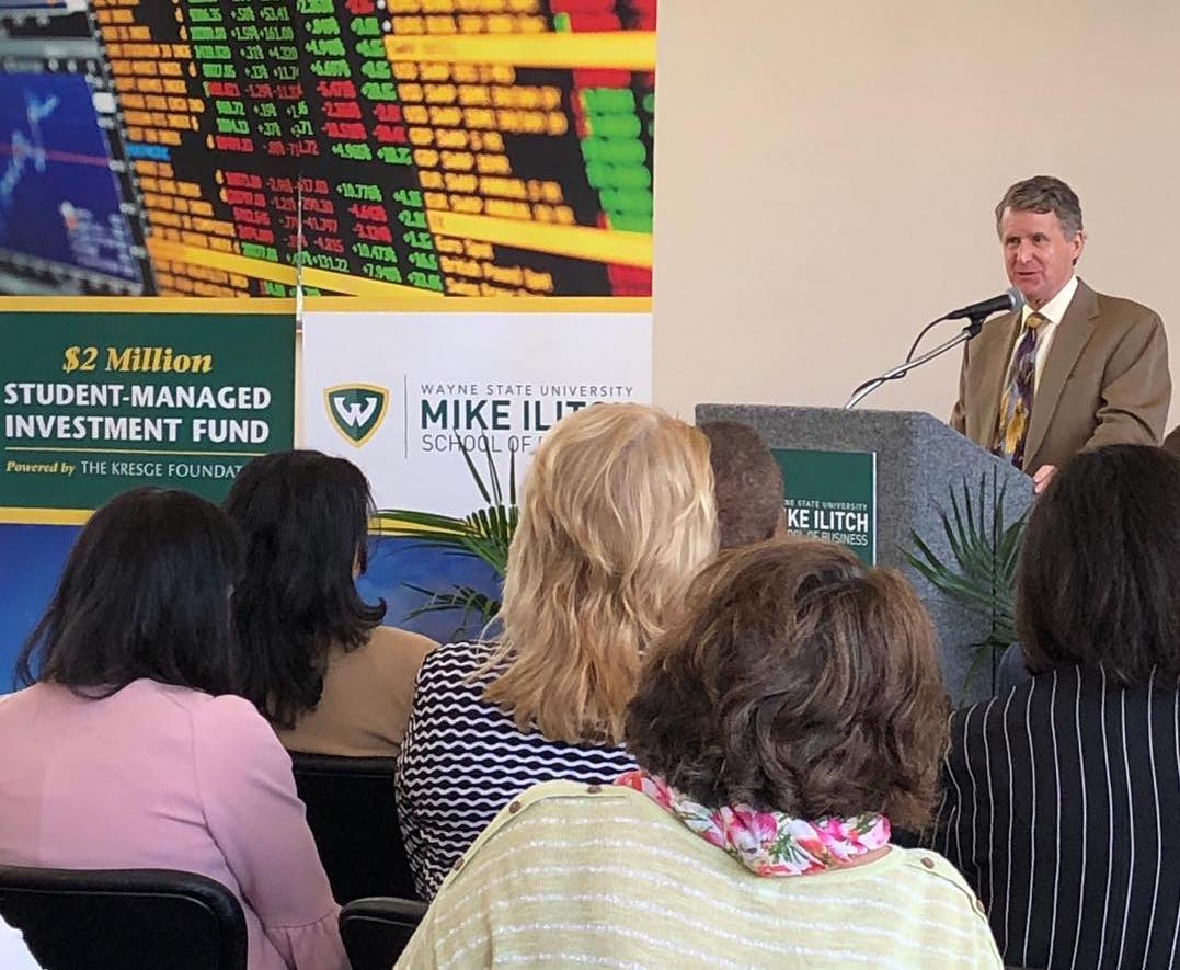 Rip Rapson, president and CEO of The Kresge Foundation, announces the new $2 million student-managed investment fund at the Mike Ilitch School of Business.
