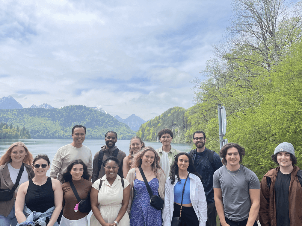 Ilitch School of Business students pose in front of the Bavarian Alps during a study abroad trip