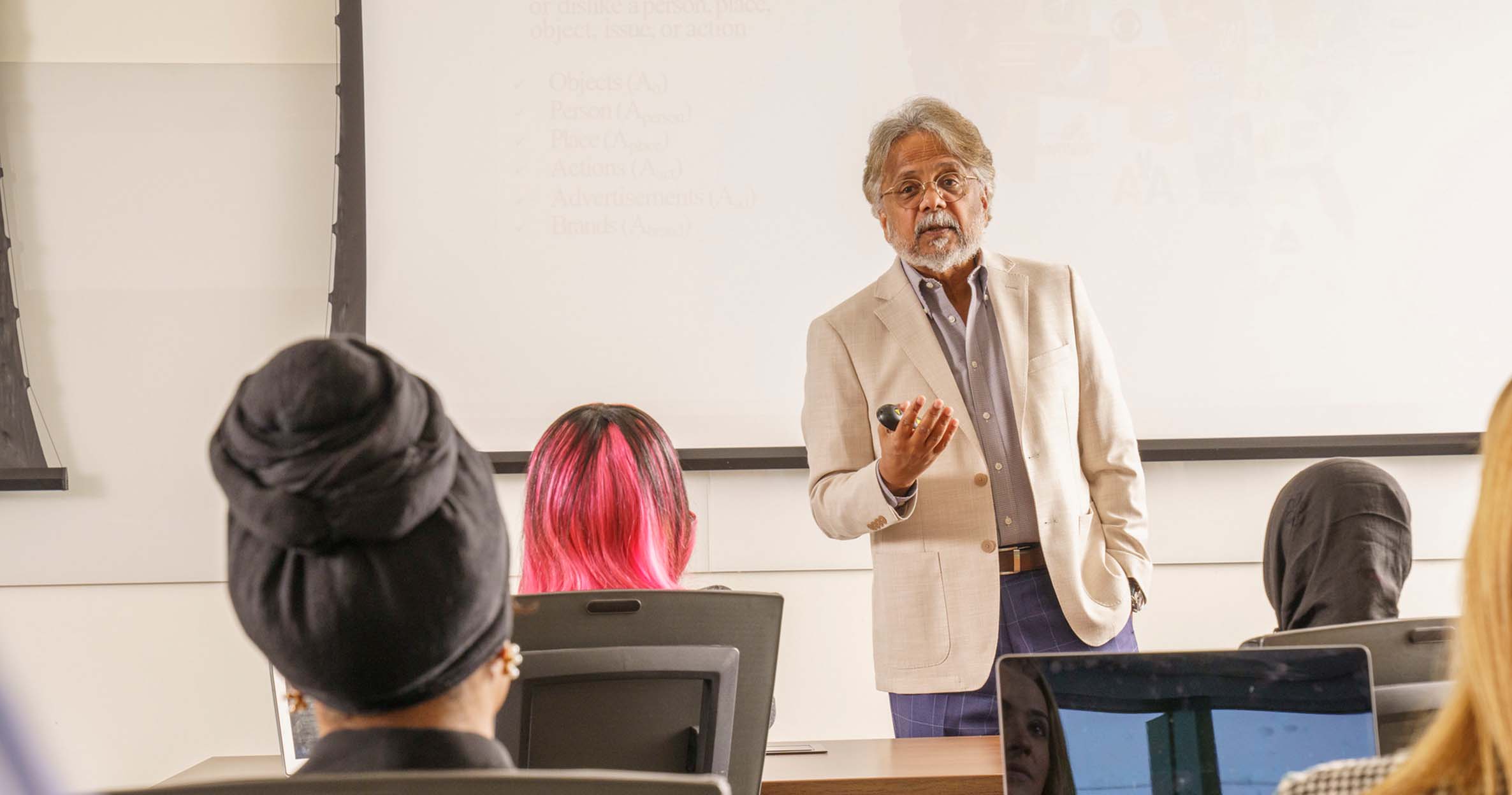 Ilitch School faculty member, Dr. Biswas, faces his class while teaching