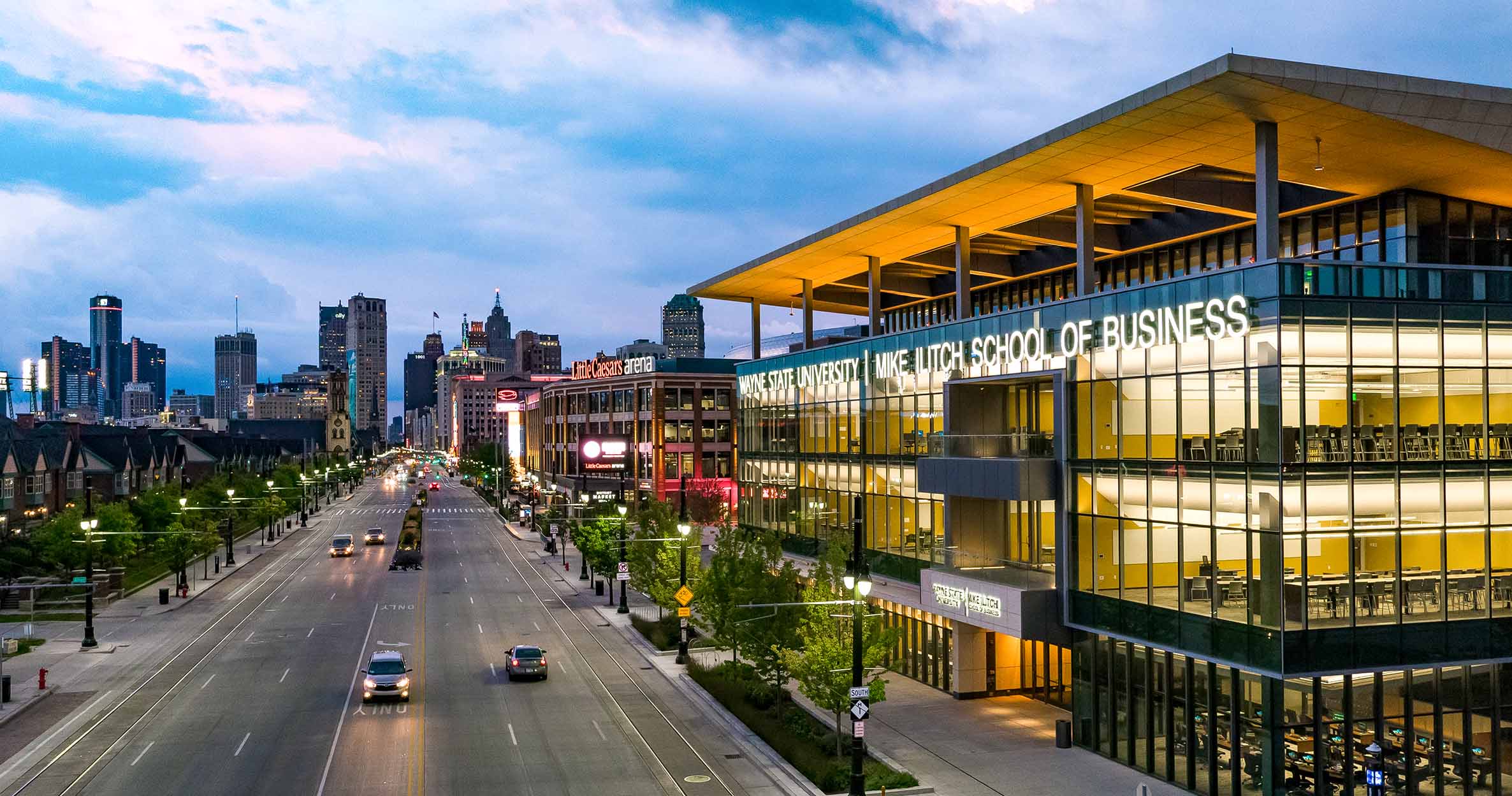 External view of Wayne State University&#039;s Mike Ilitch School of Business building at night