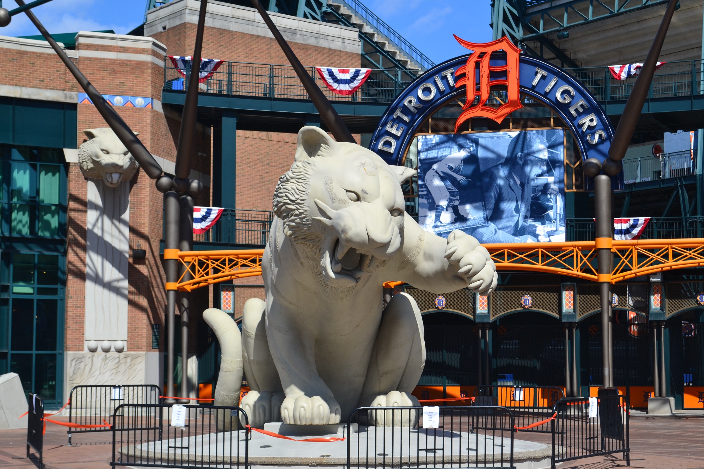 A large tiger sculpture guards a gate of Comerica Park Stadium. home of the Detroit Tigers Baseball Team